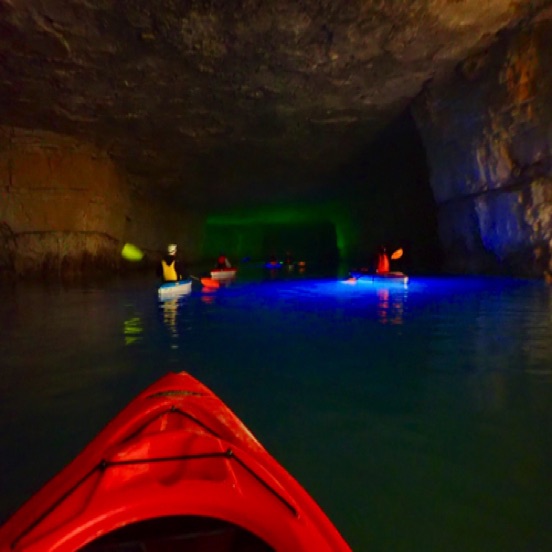 Guide in the kayak with lights.